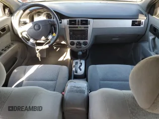 2004 Suzuki Forenza S z VIN KL5JD52Z54K991570, wystawiony jako Copart lot #49380694 z przebiegiem 98 943 mil mil oraz Szkody całkowita. Historia ofert i sprzedaży dostępna na DreamBid. Obrazek 8.