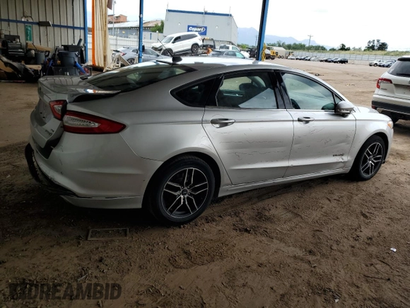 2013 Ford Fusion SE Hybrid z VIN 3FA6P0LU2DR104182, wystawiony jako Copart lot #63107545 z przebiegiem 249 317 mil mil oraz Szkoda całkowita • Salvage title. Historia ofert i sprzedaży dostępna na DreamBid. Obrazek 3.