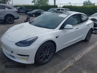 2021 Tesla Model 3 Long Range with VIN 5YJ3E1EB7MF089524, listed as a IAAI auction lot 42023474 with 19,757 mi miles and . Bid and sale history available at carsss.com. Image 2.