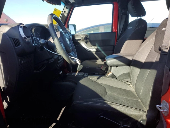 2016 Jeep Wrangler Rubicon with VIN 1C4BJWCG1GL157076, listed as a Copart auction lot 81745264 with 67,535 mi miles and Salvage title. Bid and sale history available at DreamBid. Image 7.