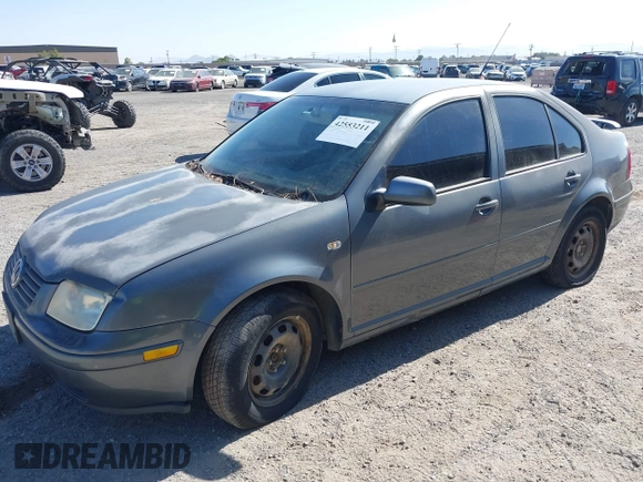 2003 Volkswagen Jetta GL z VIN 3VWRK69M43M117878, wystawiony jako IAAI lot #42553211 z przebiegiem 183 524 mil mil oraz . Historia ofert i sprzedaży dostępna na DreamBid. Obrazek 2.