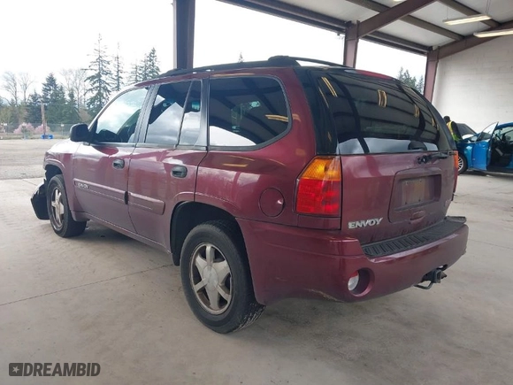 2004 GMC Envoy SLE with VIN 1GKDT13S942107722, listed as a IAAI auction lot 41935107 with 1 mi miles. Bid and sale history available at carsss.com. Image 3.