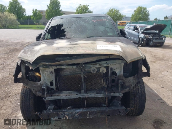 2023 Toyota Tacoma SR with VIN 3TMCZ5AN0PM636306, listed as a IAAI auction lot 42255935 with 14,131 mi miles and . Bid and sale history available at DreamBid. Image 6.