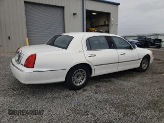 2001 Lincoln Town Car Cartier L z VIN 1LNHM85W11Y610538, wystawiony jako Copart lot #47881055 z przebiegiem 139 032 mil mil oraz Szkoda całkowita • Salvage title. Historia ofert i sprzedaży dostępna na DreamBid. Obrazek 3.