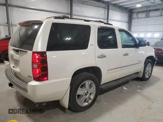 2010 Chevrolet Tahoe LTZ with VIN 1GNUKCE02AR274147, listed as a Copart auction lot 54667545 with 210,207 mi miles and Salvage title. Bid and sale history available at DreamBid. Image 3.