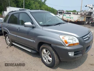 2006 Kia Sportage LX z VIN KNDJE723267175565, wystawiony jako IAAI lot #42421740 z przebiegiem 76 204 mil mil oraz . Historia ofert i sprzedaży dostępna na DreamBid. Obrazek 1.