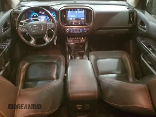 2021 GMC Canyon 4WD AT4 w/Cloth with VIN 1GTG6FEN2M1265863, listed as a Copart auction lot 49900865 with 50,102 mi miles and Salvage Title. Bid and sale history available at carsss.com. Image 8.
