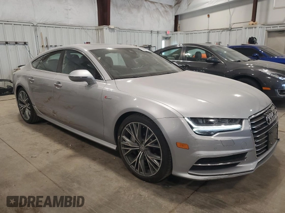2016 Audi A7 3.0 Prestige with VIN WAU2GAFC7GN104801, listed as a Copart auction lot 64997833 with 74,427 mi miles. Bid and sale history available at carsss.com. Image 4.