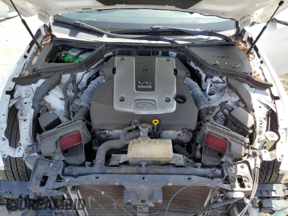 2014 Infiniti Q50 Premium z VIN JN1BV7AP5EM685839, wystawiony jako Copart lot #51238415 z przebiegiem 128 933 mil mil oraz Szkoda całkowita • Salvage title. Historia ofert i sprzedaży dostępna na DreamBid. Obrazek 13.