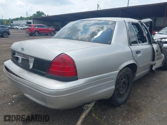 2004 Ford Police Interceptor Base w/3.27 Axle с VIN 2FAFP71W44X106319, выставлен на аукционе IAAI как лот 42701601 с пробегом 199 559 миль миль и . История ставок и продаж доступна на DreamBid. Изображение 4.