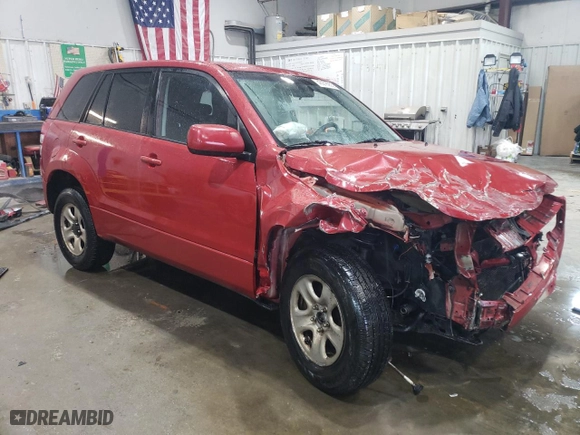 2011 Suzuki Grand Vitara Premium with VIN JS3TD0D25B4102081, listed as a Copart auction lot 43978955 with 310,535 mi miles and Salvage Title. Bid and sale history available at carsss.com. Image 4.