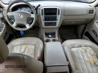 2002 Mercury Mountaineer z VIN 4M2ZU86E62ZJ06894, wystawiony jako Copart lot #56680624 z przebiegiem 200 718 mil mil oraz Nie do naprawy. Historia ofert i sprzedaży dostępna na DreamBid. Obrazek 8.