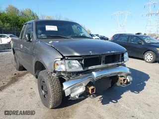 2004 Ford F-150 Heritage XL with VIN 2FTRX18W34CA97890, listed as a IAAI auction lot 42060361 with 177,385 mi miles. Bid and sale history available at carsss.com. Image 6.