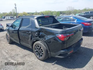 2022 Hyundai Santa Cruz SEL Premium z VIN 5NTJDDAF6NH036340, wystawiony jako IAAI lot #42062271 z przebiegiem 33 095 mil mil oraz . Historia ofert i sprzedaży dostępna na DreamBid. Obrazek 3.