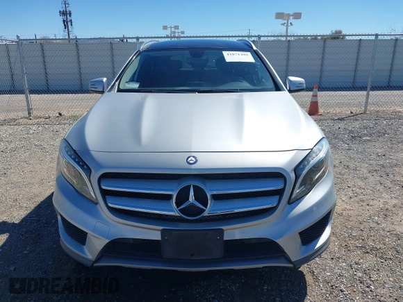 2015 Mercedes-Benz GLA 250 z VIN WDCTG4GB8FJ033607, wystawiony jako IAAI lot #41871488 z przebiegiem 53 161 mil mil oraz . Historia ofert i sprzedaży dostępna na DreamBid. Obrazek 6.