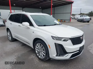 2021 Cadillac XT6 Premium Luxury with VIN 1GYKPCRS8MZ233209, listed as a IAAI auction lot 40012714 with 45,599 mi miles and . Bid and sale history available at carsss.com. Image 1.