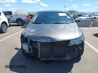 2013 Kia Forte EX with VIN KNAFU4A27D5724120, listed as a IAAI auction lot 42153084 with 154,860 mi miles. Bid and sale history available at carsss.com. Image 6.