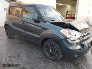 2011 Kia Soul + with VIN KNDJT2A26B7258864, listed as a IAAI auction lot 41068819 with 244,397 mi miles. Bid and sale history available at carsss.com. Image 1.