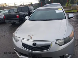 2012 Acura TSX Tech Pkg with VIN JH4CU2F62CC012290, listed as a IAAI auction lot 40765338 with 129,737 mi miles. Bid and sale history available at carsss.com. Image 12.