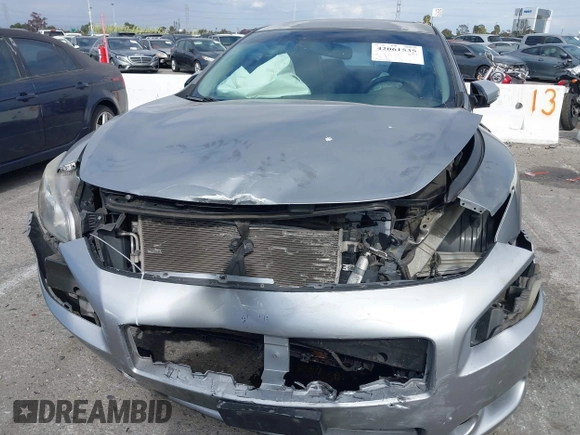 2009 Nissan Maxima SV z VIN 1N4AA51EX9C803098, wystawiony jako IAAI lot #42061535 z przebiegiem 140 576 mil mil oraz . Historia ofert i sprzedaży dostępna na DreamBid. Obrazek 6.