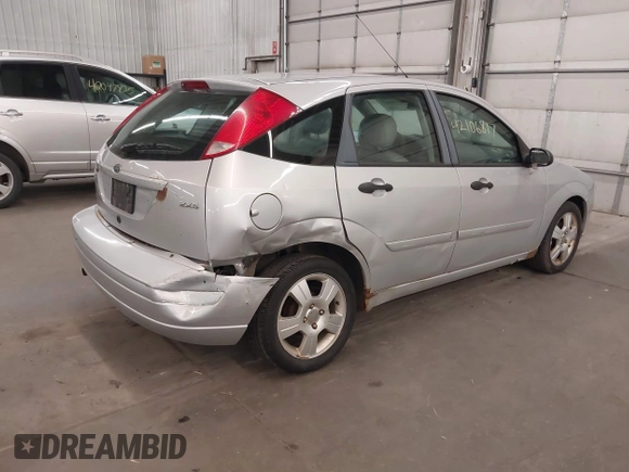 2005 Ford Focus S with VIN 3FAFP37N15R138393, listed as a IAAI auction lot 42106817 with 144,047 mi miles and . Bid and sale history available at carsss.com. Image 4.