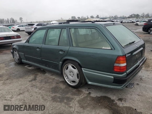 1993 Mercedes-Benz 300 with VIN WDBEA92E7PF259851, listed as a Copart auction lot 50561015 with 214,346 mi miles and Salvage Title. Bid and sale history available at DreamBid. Image 2.