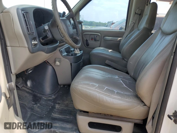 1999 Chevrolet Express Cargo with VIN 1GCHG35R3X1110004, listed as a Copart auction lot 59386095 with 141,925 mi miles and Salvage title. Bid and sale history available at DreamBid. Image 7.