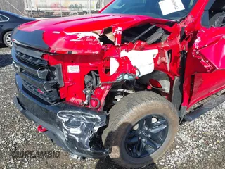 2021 Chevrolet Silverado 1500 LT Trail Boss with VIN 1GCPYFEDXMZ160460, listed as a IAAI auction lot 41693612 with 89,913 mi miles and . Bid and sale history available at DreamBid. Image 6.
