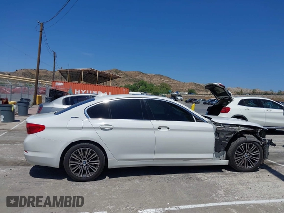 2019 BMW 5 Series 530e with VIN WBAJA9C53KB391999, listed as a IAAI auction lot 42311824 with 79,196 mi miles and . Bid and sale history available at DreamBid. Image 14.