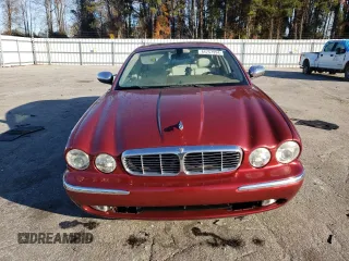 2004 Jaguar XJ VDP with VIN SAJWA74C14SG25722, listed as a Copart auction lot 84757994 with 62,152 mi miles and Salvage Title. Bid and sale history available at carsss.com. Image 5.