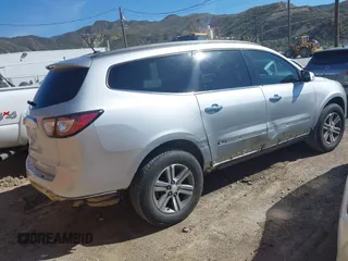 2015 Chevrolet Traverse LT with VIN 1GNKRGKD4FJ243697, listed as a IAAI auction lot 41809476 with 127,830 mi miles and . Bid and sale history available at DreamBid. Image 4.