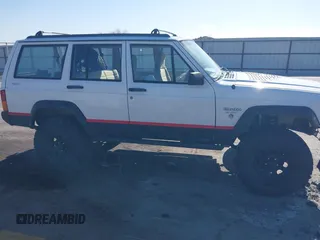 1995 Jeep Cherokee Sport with VIN 1J4FJ68S1SL576255, listed as a IAAI auction lot 42178902 with 214,041 mi miles and . Bid and sale history available at DreamBid. Image 13.