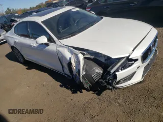 2021 Volvo S60 Momentum with VIN 7JRA22TK6MG102246, listed as a Copart auction lot 77527944 with 59,800 mi miles and Salvage Title. Bid and sale history available at carsss.com. Image 4.