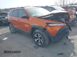 2015 Jeep Cherokee Trailhawk with VIN 1C4PJMBB3FW642266, listed as a IAAI auction lot 41510571 with 72,030 mi miles and . Bid and sale history available at carsss.com. Image 1.