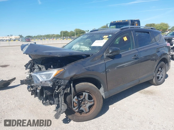 2018 Toyota RAV4 LE with VIN JTMZFREV7JJ207270, listed as a IAAI auction lot 41853828 with 89,179 mi miles. Bid and sale history available at carsss.com. Image 2.