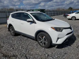 2016 Toyota RAV4 XLE with VIN 2T3WFREV3GW263574, listed as a Copart auction lot 48700335 with 61,103 mi miles and Salvage Title. Bid and sale history available at carsss.com. Image 4.