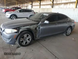2013 BMW 5 Series 528i with VIN WBAXG5C5XDDY36974, listed as a Copart auction lot 63494985 with 89,880 mi miles and Salvage title. Bid and sale history available at DreamBid. Image 1.