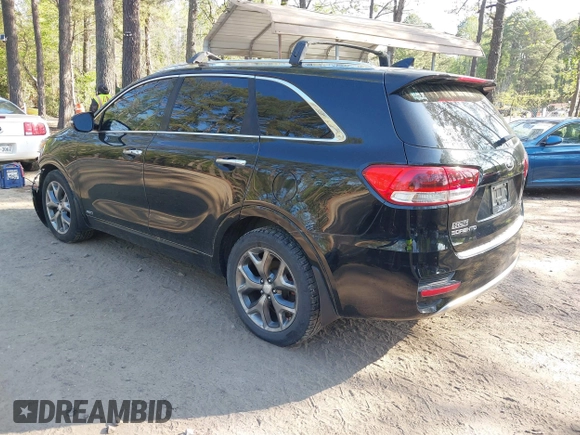 2016 Kia Sorento SX with VIN 5XYPKDA58GG127772, listed as a IAAI auction lot 42002092 with 138,367 mi miles and . Bid and sale history available at DreamBid. Image 3.