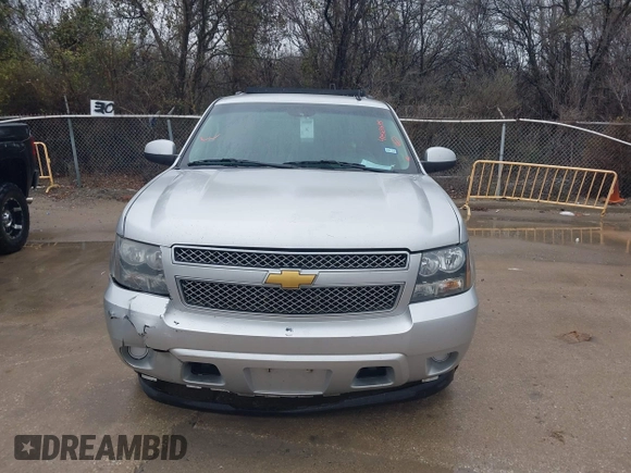 2014 Chevrolet Suburban LS with VIN 1GNSCHE08ER217393, listed as a IAAI auction lot 41563635 with 212,852 mi miles. Bid and sale history available at carsss.com. Image 12.