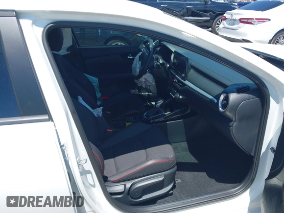 2024 Kia Forte GT with VIN 3KPF44AC3RE821239, listed as a IAAI auction lot 42025884 with 6,593 mi miles and . Bid and sale history available at DreamBid. Image 5.