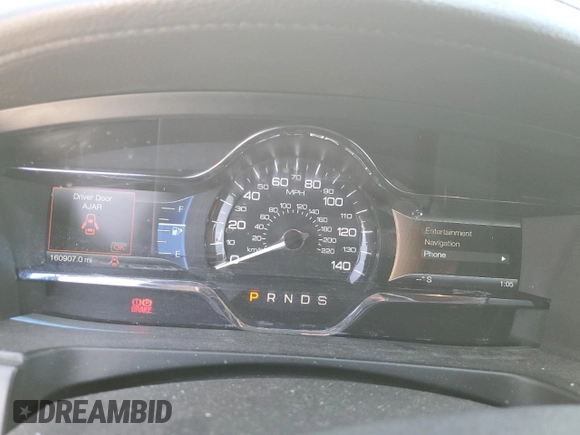 2015 Lincoln MKS с VIN 1LNHL9DK7FG605218, выставлен на аукционе Copart как лот 50882695 с пробегом 160 907 миль миль и Списание • Salvage title. История ставок и продаж доступна на DreamBid. Изображение 9.