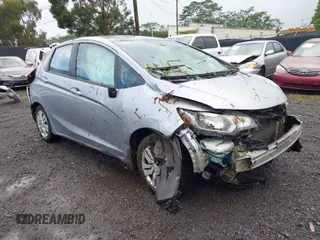 2017 Honda Fit LX with VIN 3HGGK5G53HM700502, listed as a IAAI auction lot 40777067 with 95,827 mi miles and . Bid and sale history available at DreamBid. Image 1.