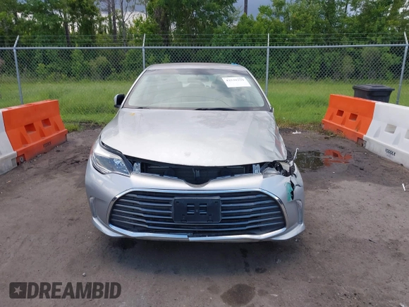 2016 Toyota Avalon Limited z VIN 4T1BK1EB7GU242074, wystawiony jako IAAI lot #42539359 z przebiegiem 37 736 mil mil oraz . Historia ofert i sprzedaży dostępna na DreamBid. Obrazek 12.