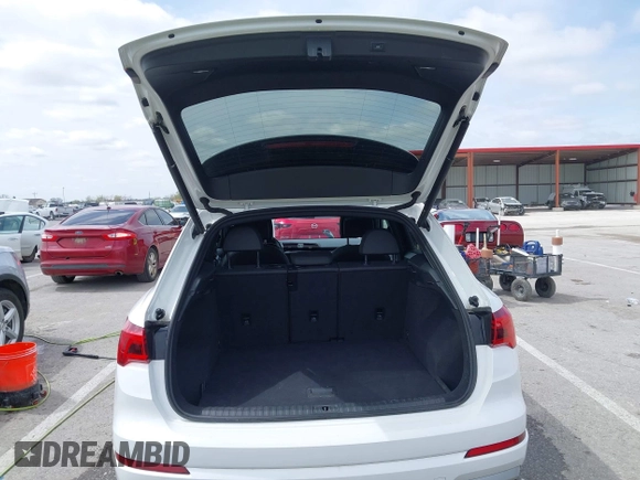 2021 Audi Q3 Premium with VIN WA1AUCF33M1096437, listed as a IAAI auction lot 41910411 with 86,837 mi miles and . Bid and sale history available at DreamBid. Image 18.