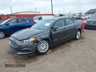 2016 Ford Fusion SE Hybrid with VIN 3FA6P0LU5GR235241, listed as a IAAI auction lot 41697504 with 165,510 mi miles. Bid and sale history available at carsss.com. Image 17.