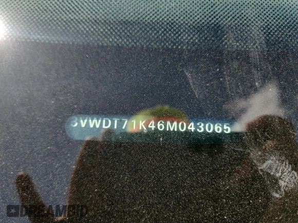 2006 Volkswagen Jetta 1.9L TDI z VIN 3VWDT71K46M043065, wystawiony jako Copart lot #62080885 z przebiegiem 279 917 mil mil oraz Nie do naprawy • Non repairable. Historia ofert i sprzedaży dostępna na DreamBid. Obrazek 13.