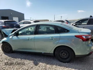 2012 Ford Focus SE with VIN 1FAHP3F24CL163896, listed as a Copart auction lot 61651015 with Not provided miles and Salvage title. Bid and sale history available at DreamBid. Image 2.