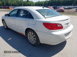 2010 Chrysler Sebring Limited with VIN 1C3CC5FD9AN199621, listed as a IAAI auction lot 42616882 with 110,512 mi miles and . Bid and sale history available at DreamBid. Image 3.