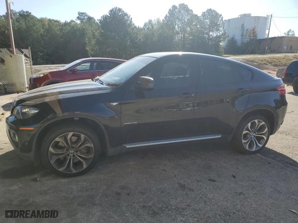2014 BMW X6 50i with VIN 5UXFG8C54EL593085, listed as a Copart auction lot 75775084 with 0 mi miles and Salvage Title. Bid and sale history available at carsss.com. Image 1.