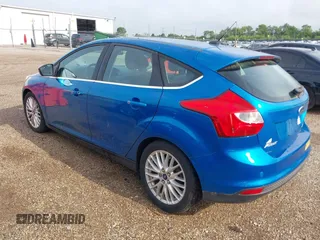 2014 Ford Focus Titanium with VIN 1FADP3N28EL119791, listed as a IAAI auction lot 42712044 with 144,338 mi miles and . Bid and sale history available at DreamBid. Image 3.